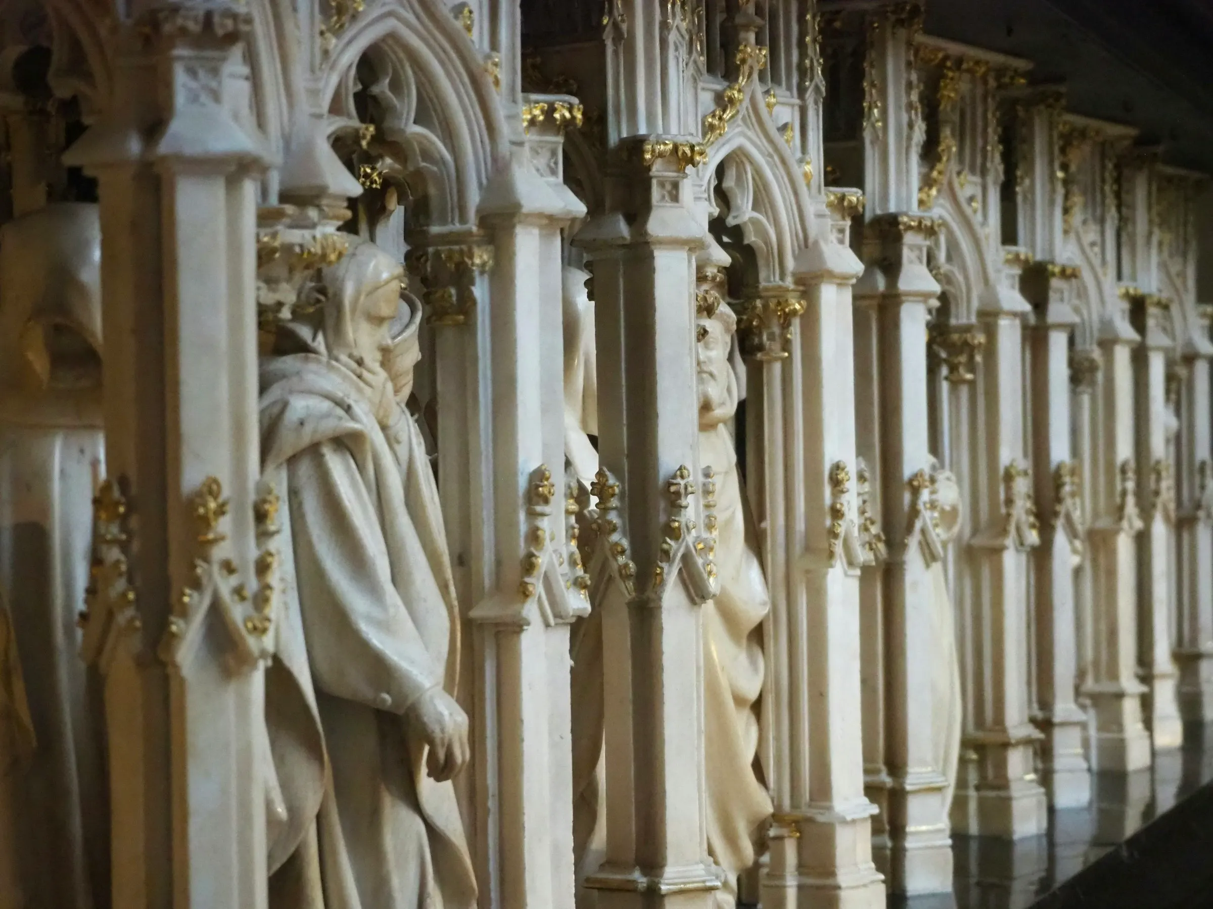 Close-up of the alabaster mourner figures and gilded Gothic canopies of the Tombs of the Dukes of Burgundy in Dijon's Musee des Beaux-Arts