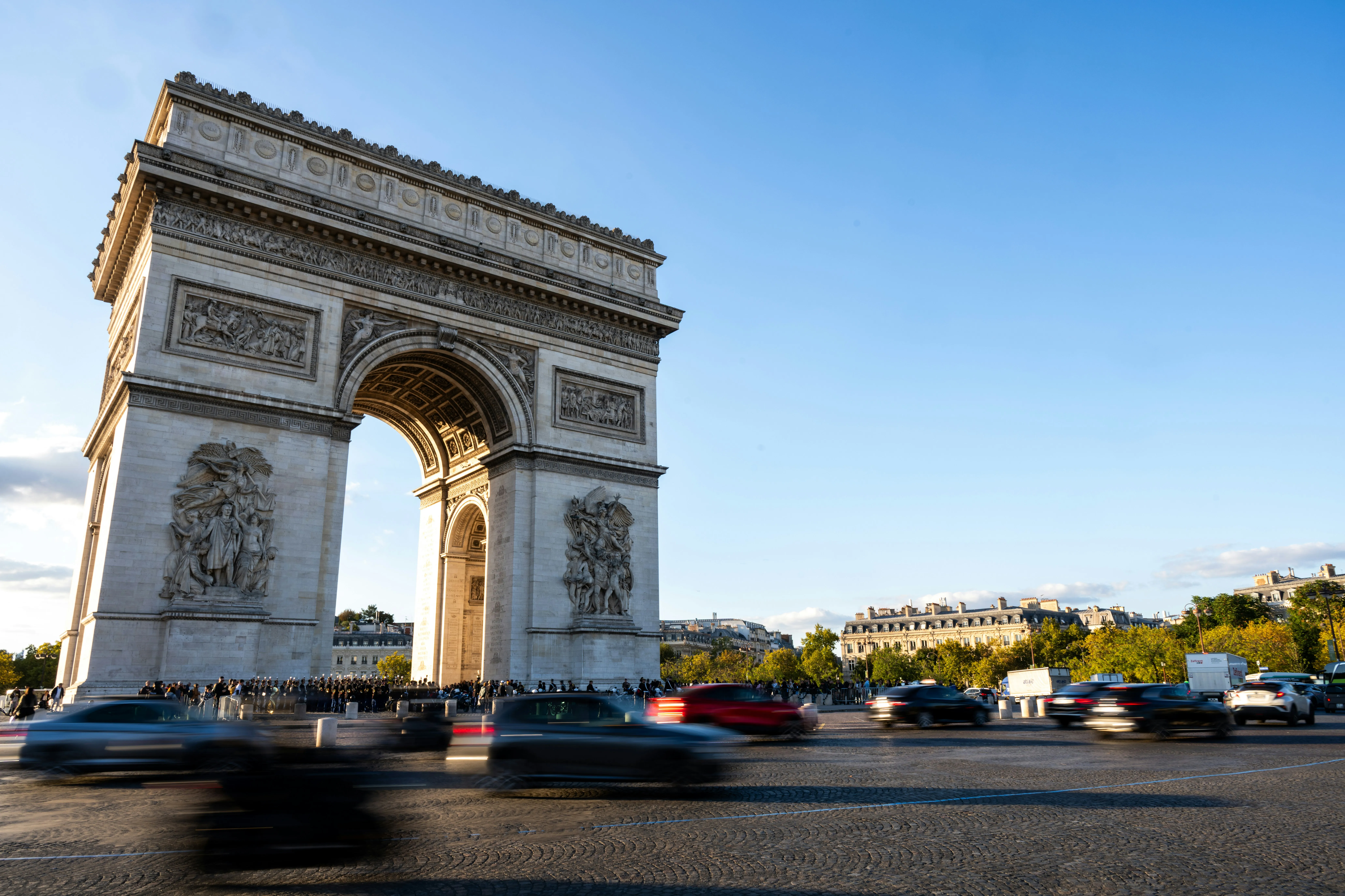 Traffic streaming around the Arc de Triomphe in Paris